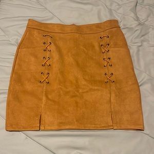 Burnt orange suede skirt from Amazon. Size XXL but runs like a L/XL STRETCHY